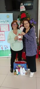 Rose Volunteers presenting Gift Cards
